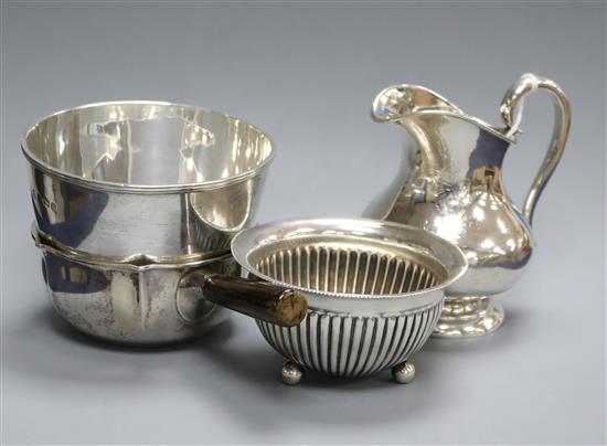 A Danish white metal brandy pan, a similar cream jug, a silver bowl and one other bowl.